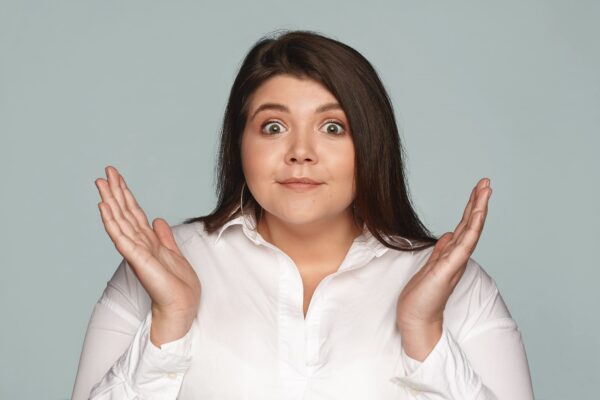funny-dark-haired-overweight-female-throwing-out-her-hands-being-at-loss-having-confused-puzzled-look-her-eyes-full-of-surprise-and-astonishment-600x400.jpg